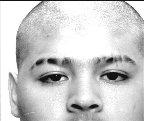 gang insignia meaning eyebrow slit.